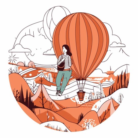 Young woman flying on hot air balloon in the mountains.