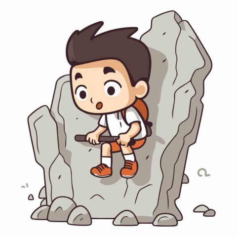 Little boy climbing on a rock of a boy climbing on a rock.