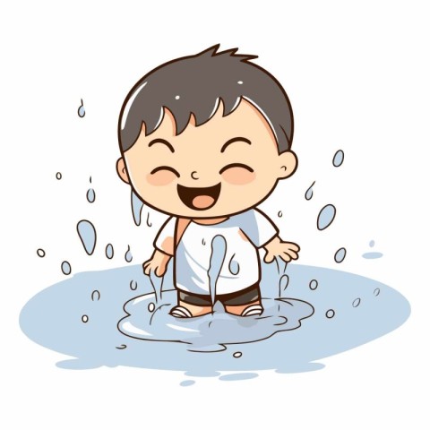 Little boy splashing water in a puddle.