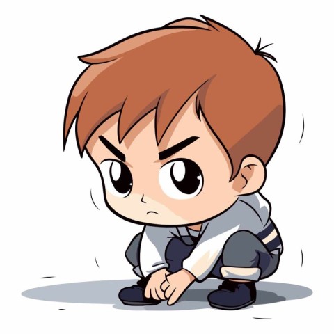 Sad little boy sitting on the floor and looking at something.