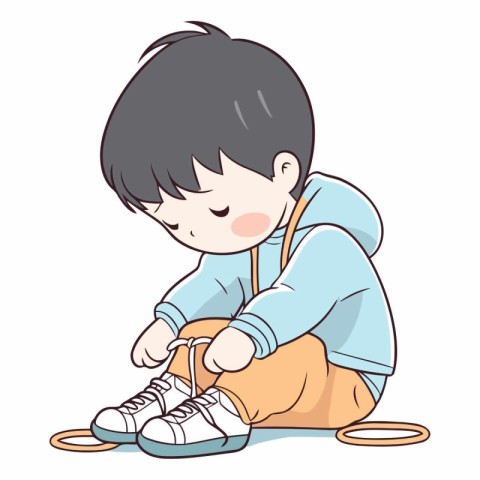 Little boy tying shoelaces on the shoelaces.