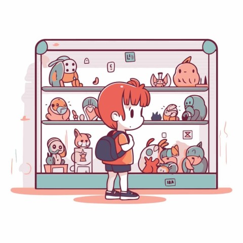 Cute little boy standing in front of a shelf full of toys.