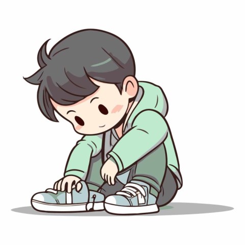 Boy sitting and tying shoelaces on sneakers.