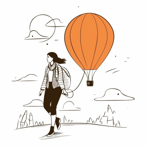 Woman with a backpack on the background of a hot air balloon.