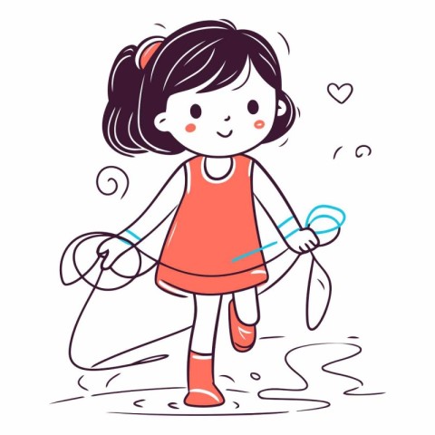 Cute little girl playing with a skipping rope.