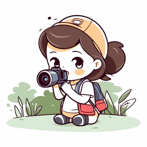 Cute little girl with camera in the park.