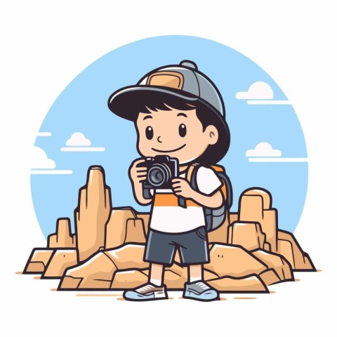 Cute little boy with a camera in the mountains