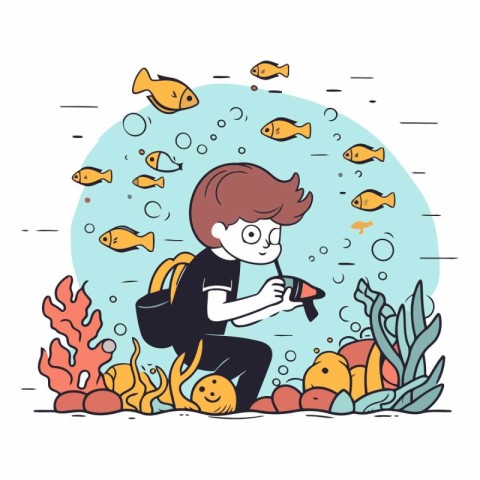 Boy with a backpack looks at the fish in the sea