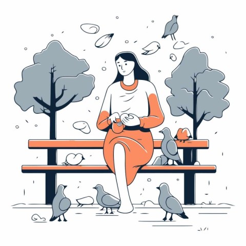 Girl sitting on a bench in the park and feeding pigeons.