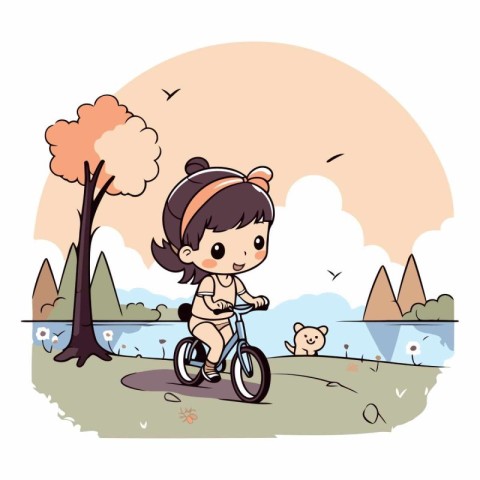 Cute little girl riding a bicycle in the park