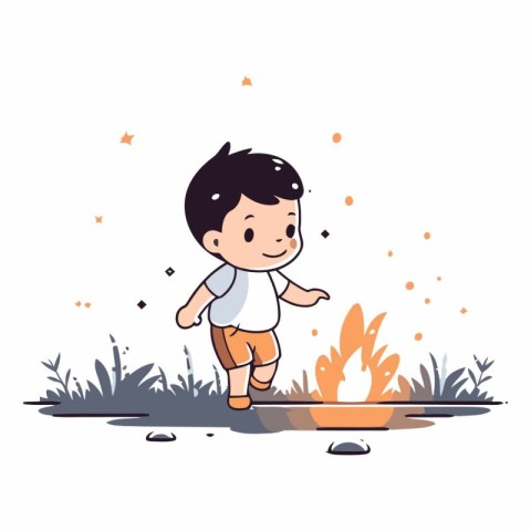 Cute little boy standing near the campfire.