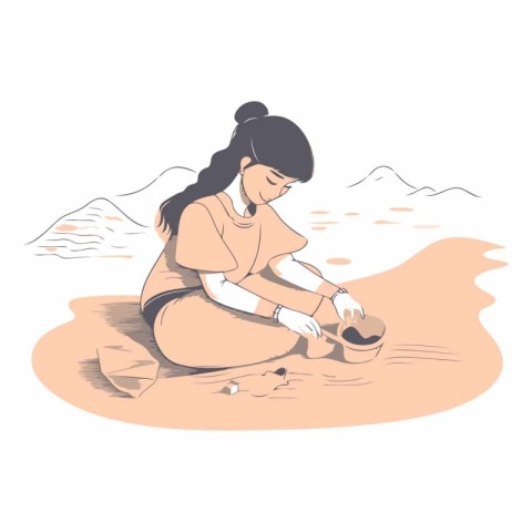 Young woman sitting on the sand in the desert.