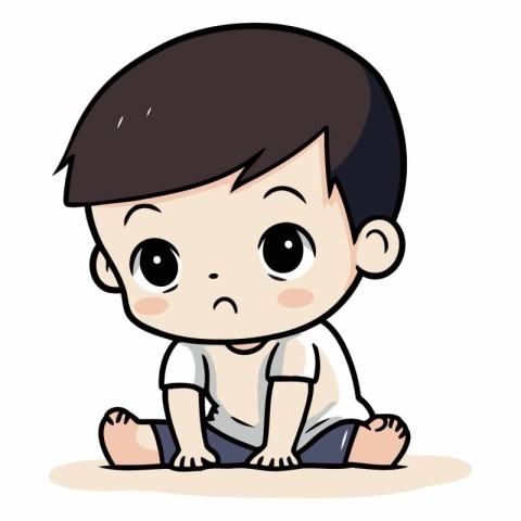 Cute little boy sitting and looking at camera.