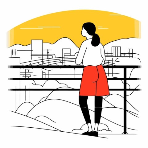 Girl standing on the bridge and looking at the city