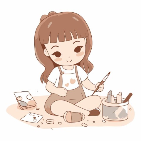 Cute little girl painting with watercolors.