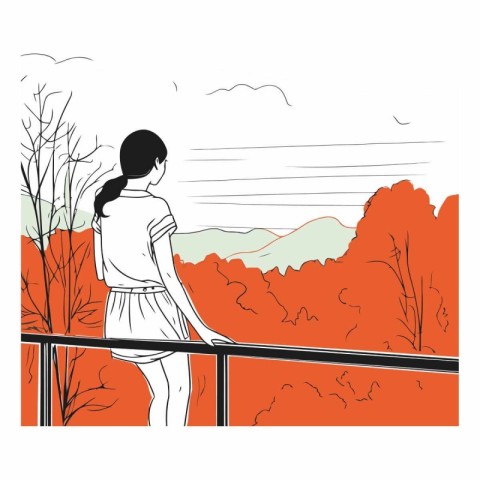 Woman standing on the balcony and looking at the landscape