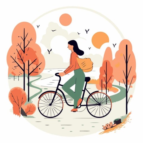 Young woman riding a bicycle in the autumn park.