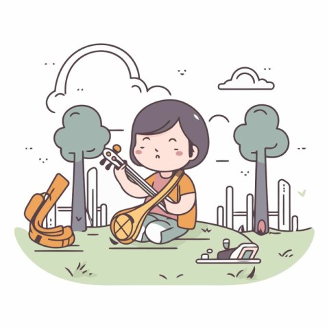 Girl playing ukulele in the park.