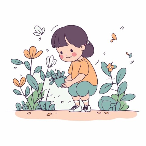 Cute little girl watering plants in the garden.