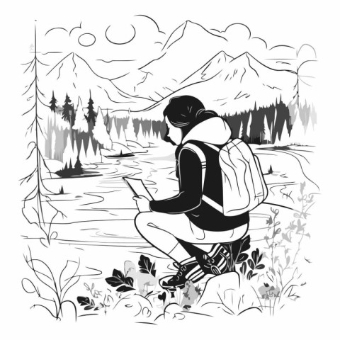 Hiker with a backpack sits on the bank of a mountain river.