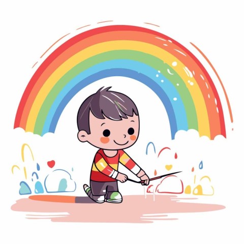 Cute little boy painting a rainbow with a brush.