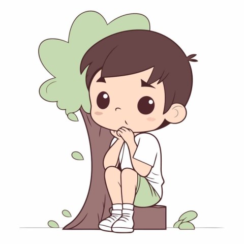 Cute little boy sitting under a tree and thinking.