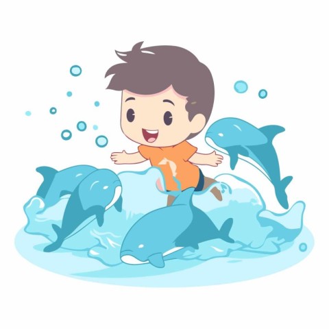 Cute little boy playing with dolphins in the sea