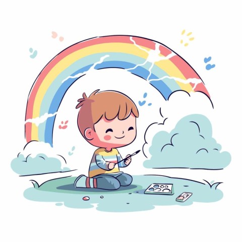 Cute little boy painting a rainbow with paints.