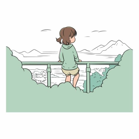 Little girl standing on the balcony and looking at the mountains