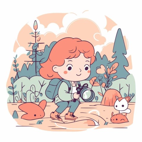 Cute little boy with a camera in the forest.