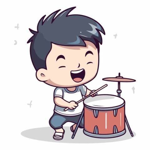 Cute boy playing drums of a boy playing drums.