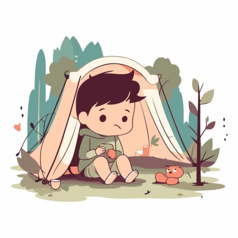 Cute little boy sitting in a tent in the park