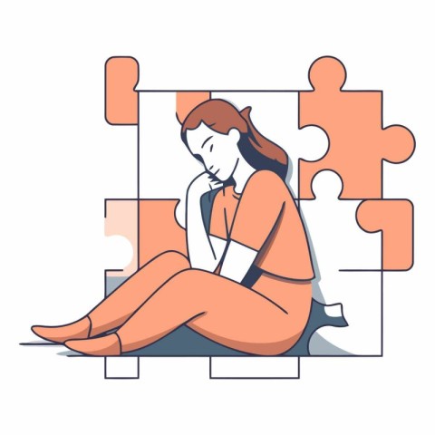 Sad woman sitting on the floor with a puzzle.