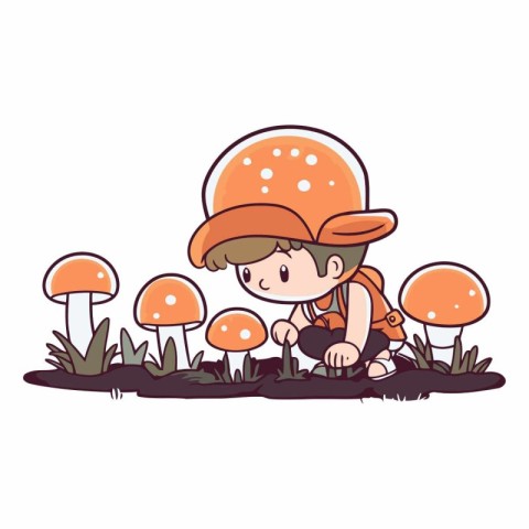 Cute little boy picking mushrooms in the garden.