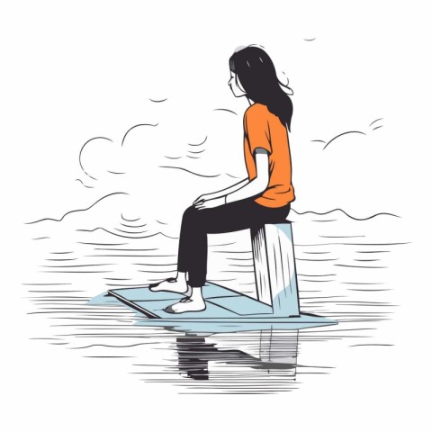 Young woman sitting on a surfboard in the sea