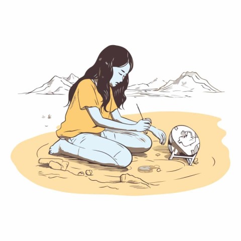 Girl sitting on the sand and drawing with pencil.